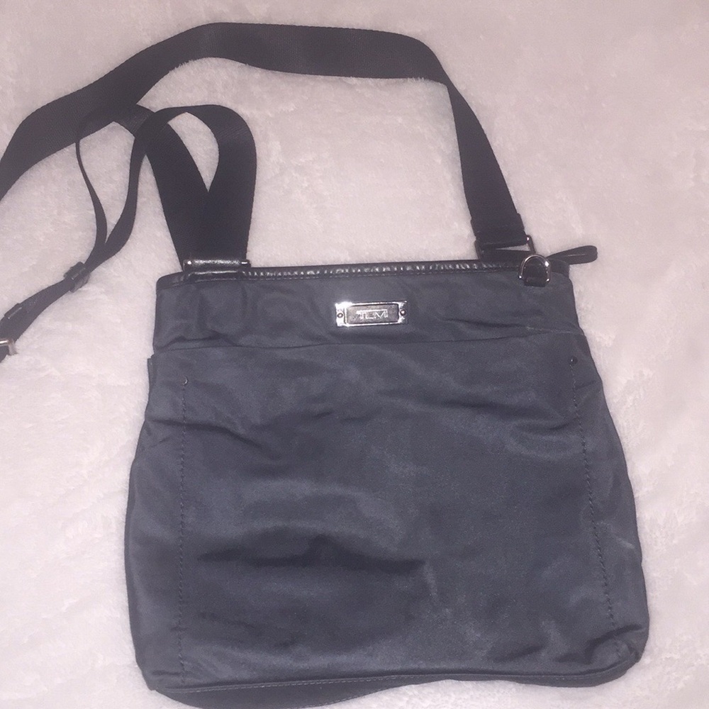 Tumi cross body purse